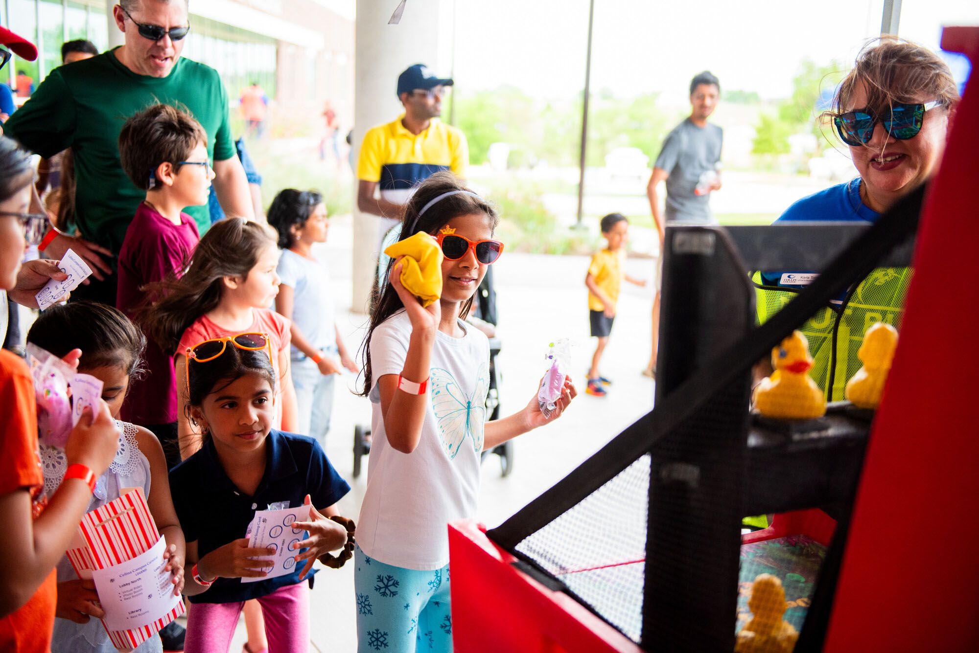 A child plays a carnival game at the 2024 Celina Campus Carnival.