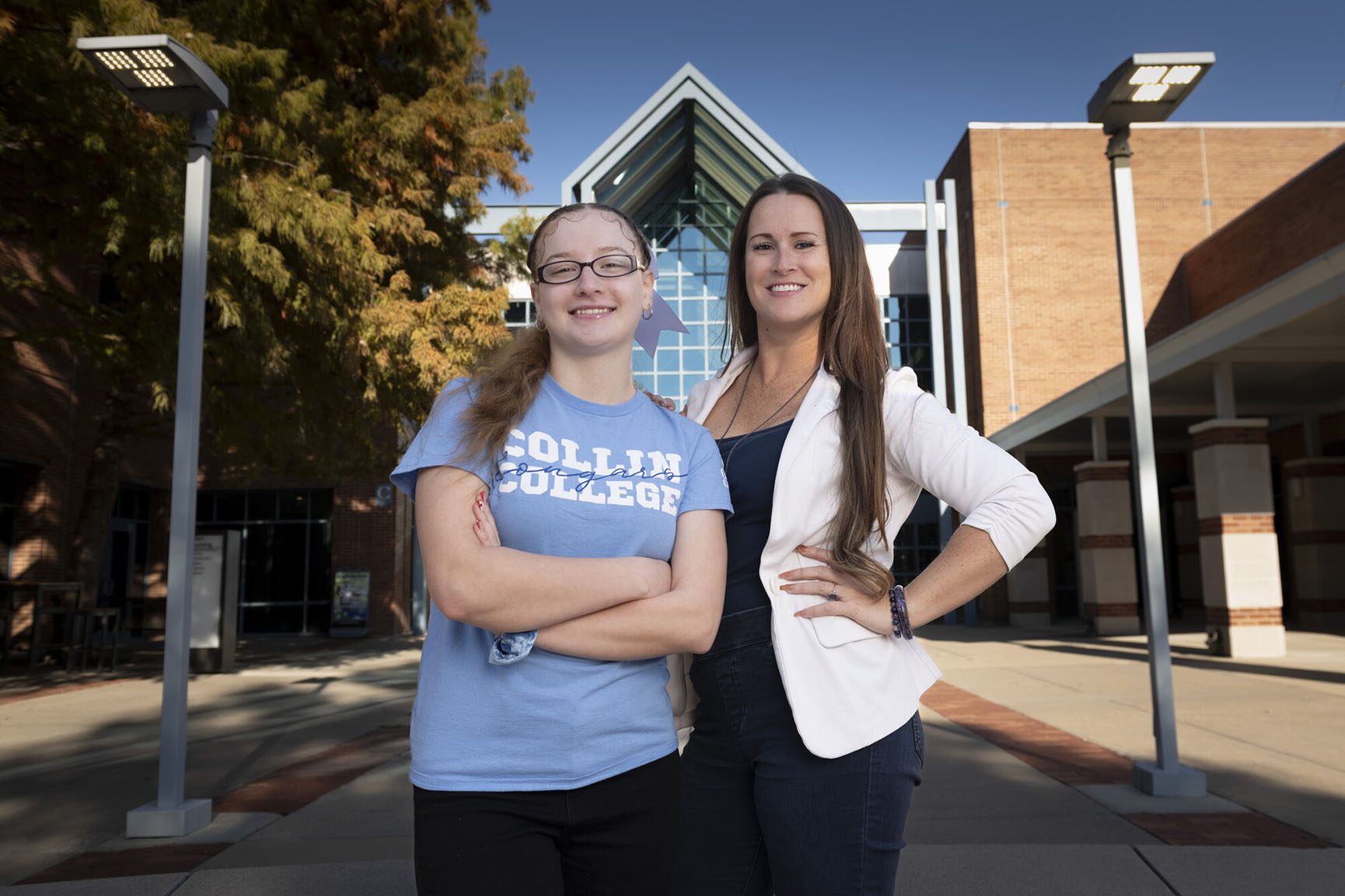 Jordan’a Jordan (left) is one of more than 100 former foster students who work with Susan Karlsen (right) and Fostering Success volunteers each year.